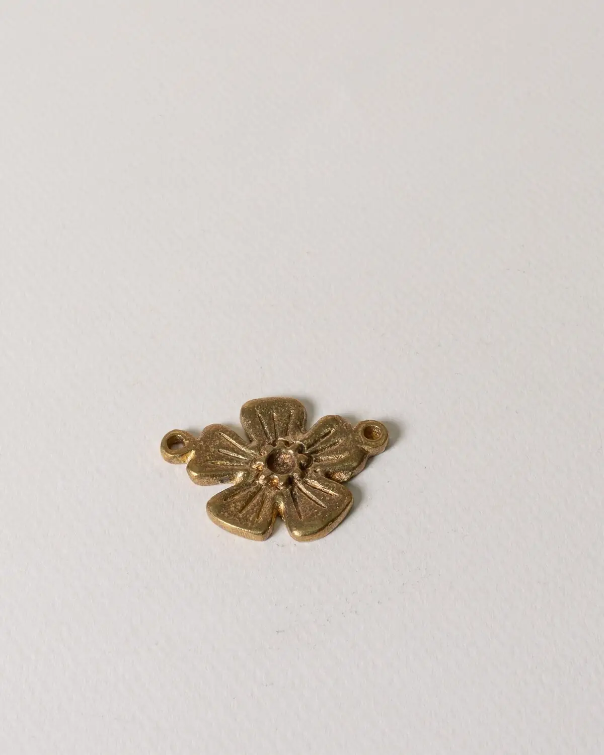 Colgante flor de bronce