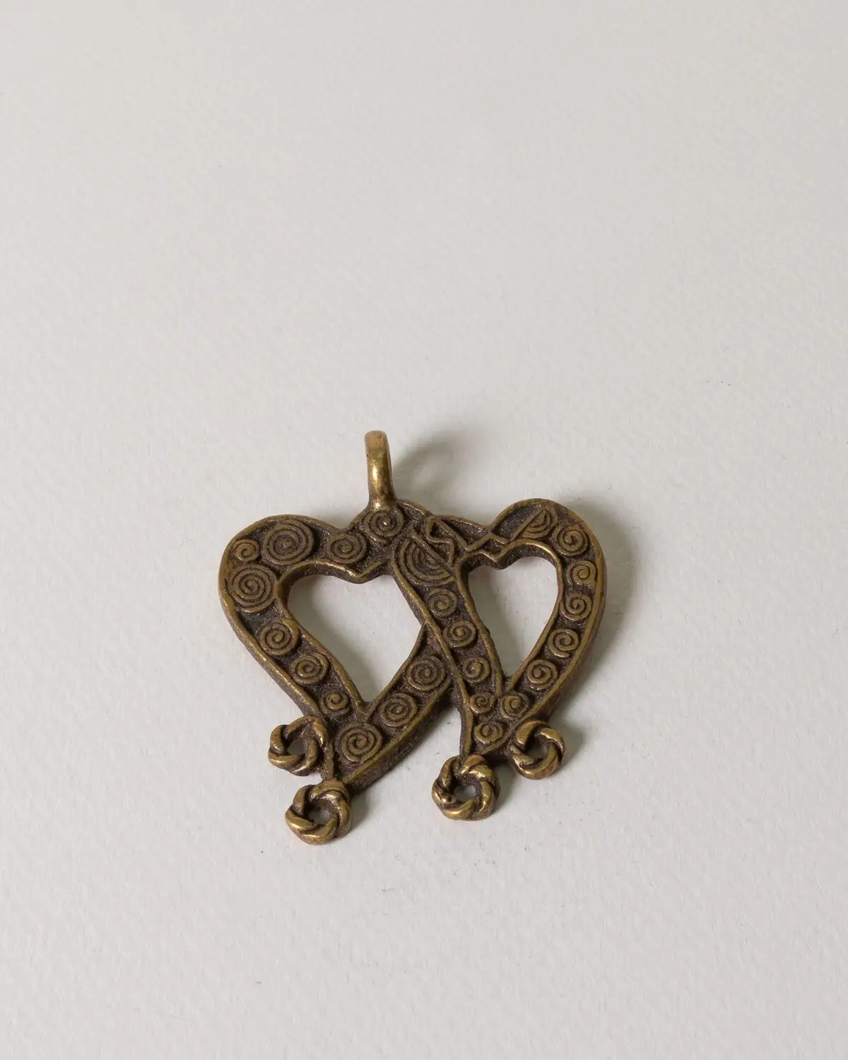 Corazón de bronce doble