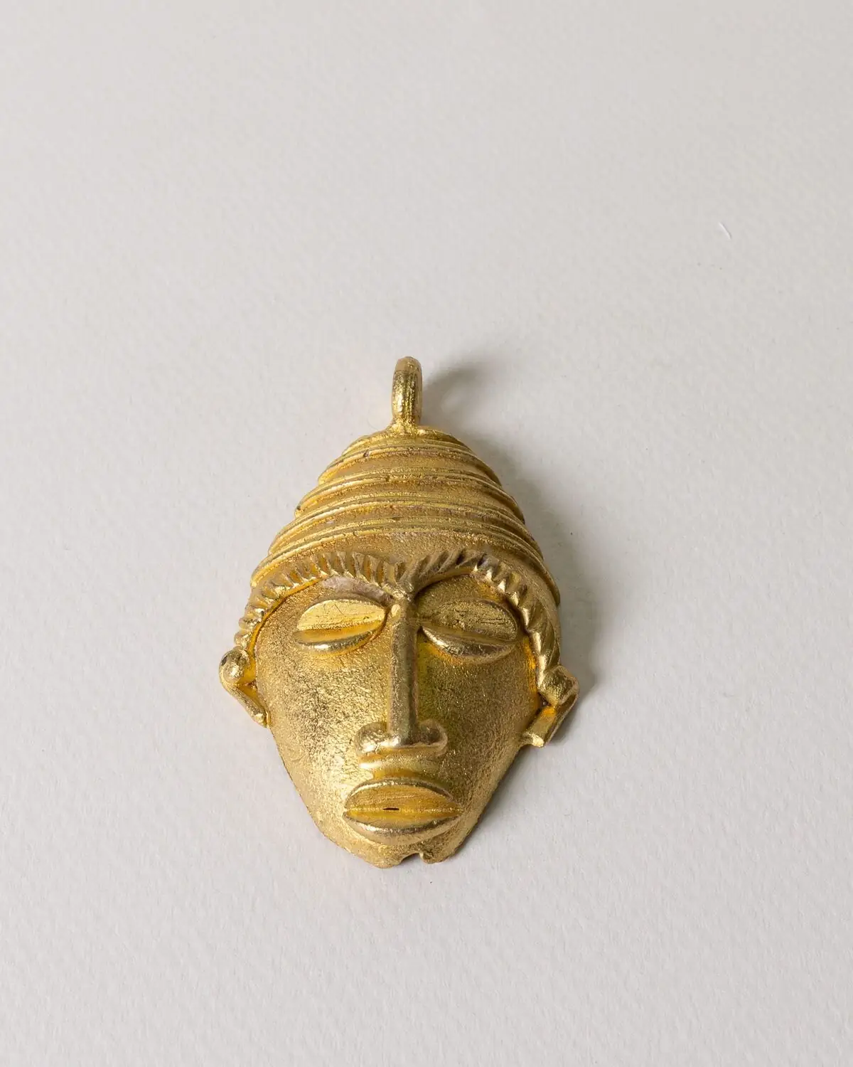 Máscara de bronce hecha a mano