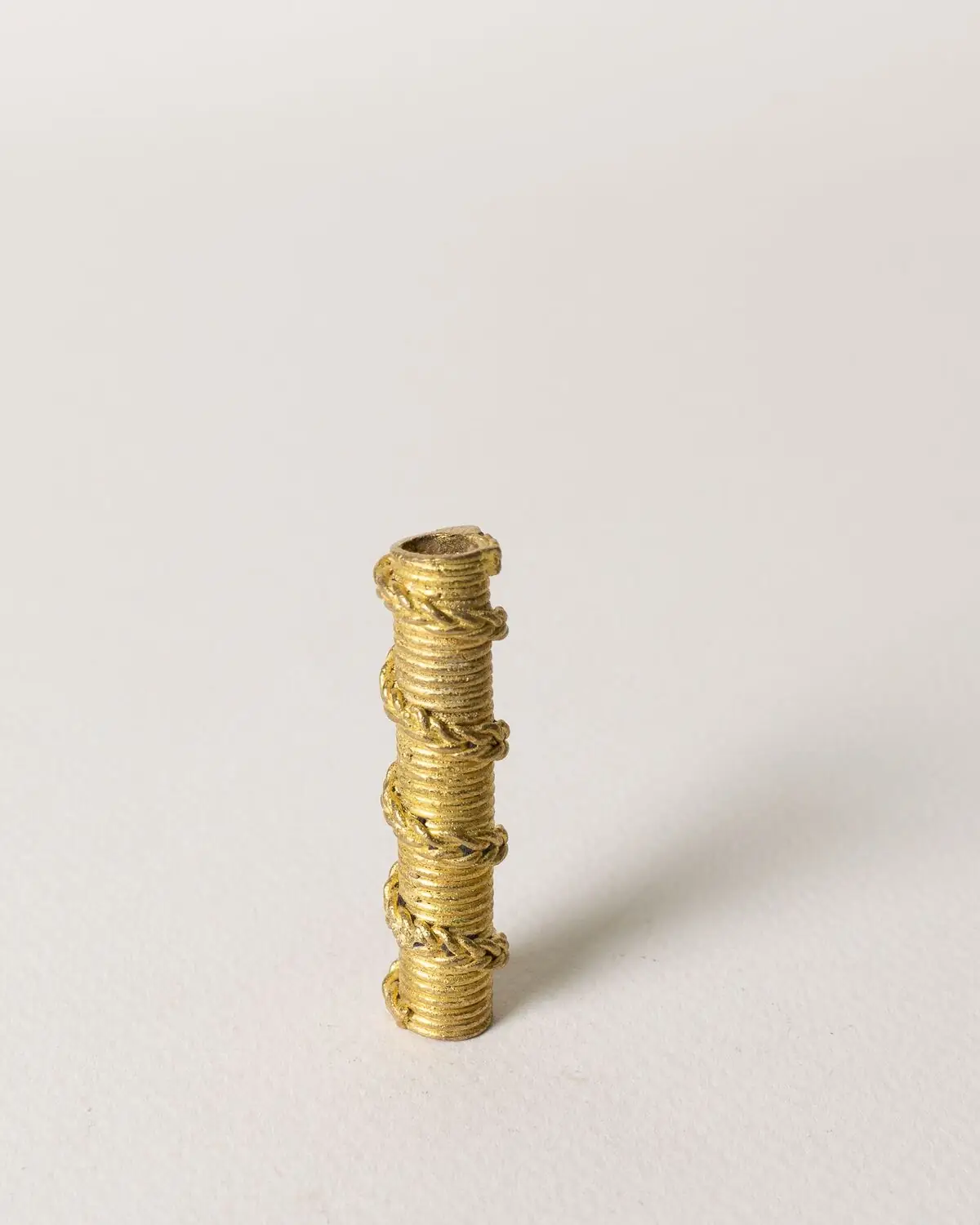 Tubo de bronce