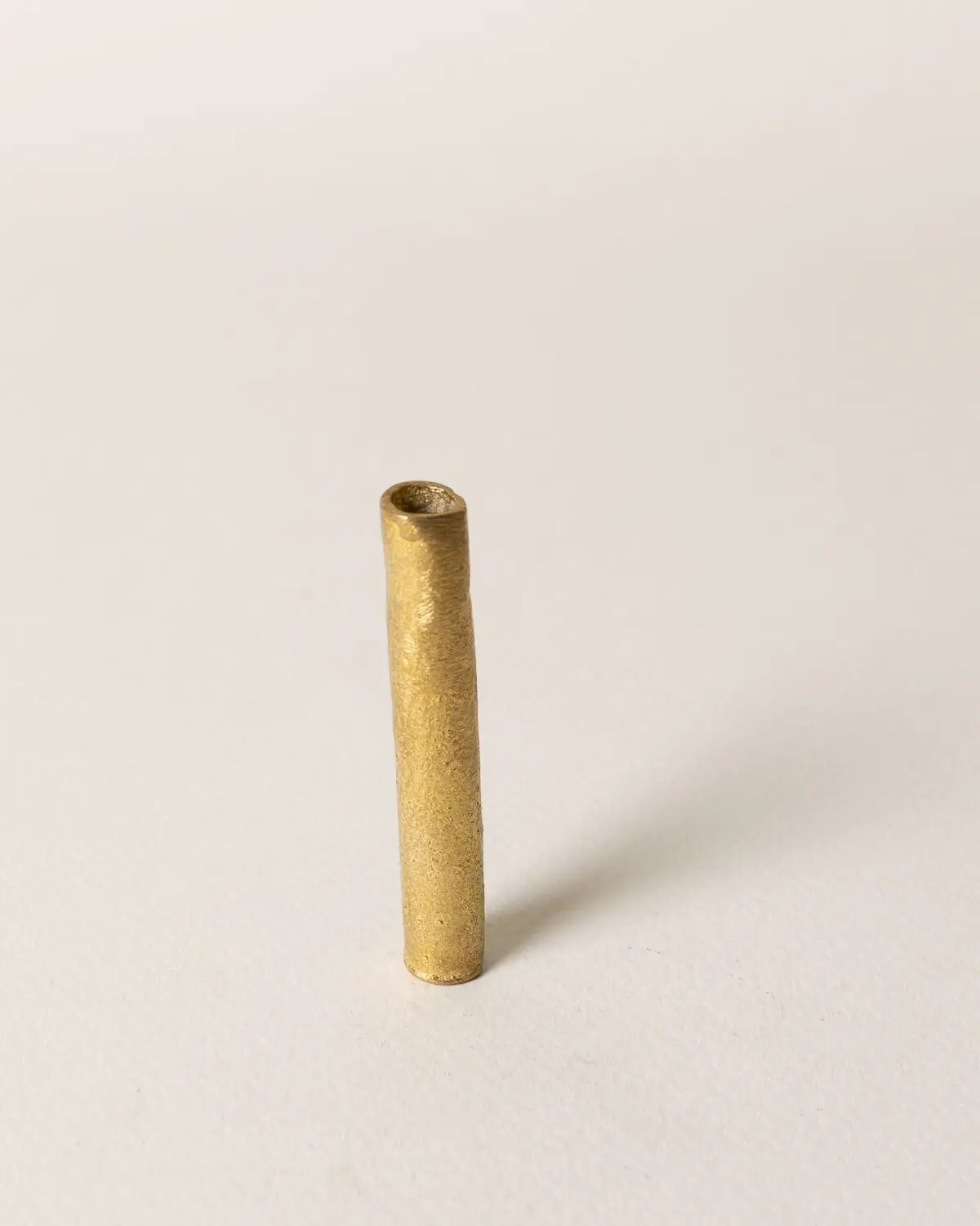 Tubo de bronce